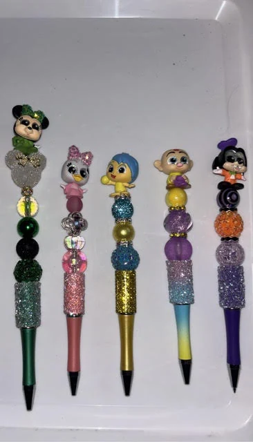 Five colorful handmade beaded pens